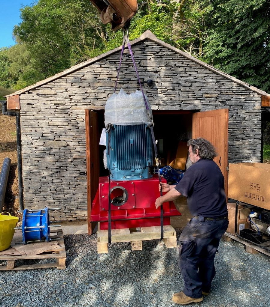 Low Wood Bay hydro electric turbine being installed in Lakeland style barn 