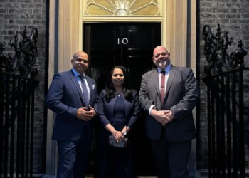 McMenon CEO Anand Puthran, McMenon COO Shiby Bernard and Workington MP Mark Jenkinson