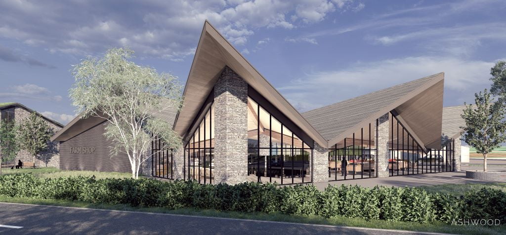 Modern farm shop with large glass windows and angled roof.