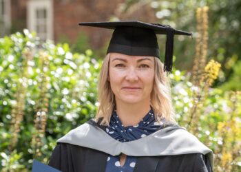 Graduate in cap and gown