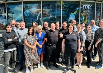 Team photo outside MTC Manufacturing Technology Centre.