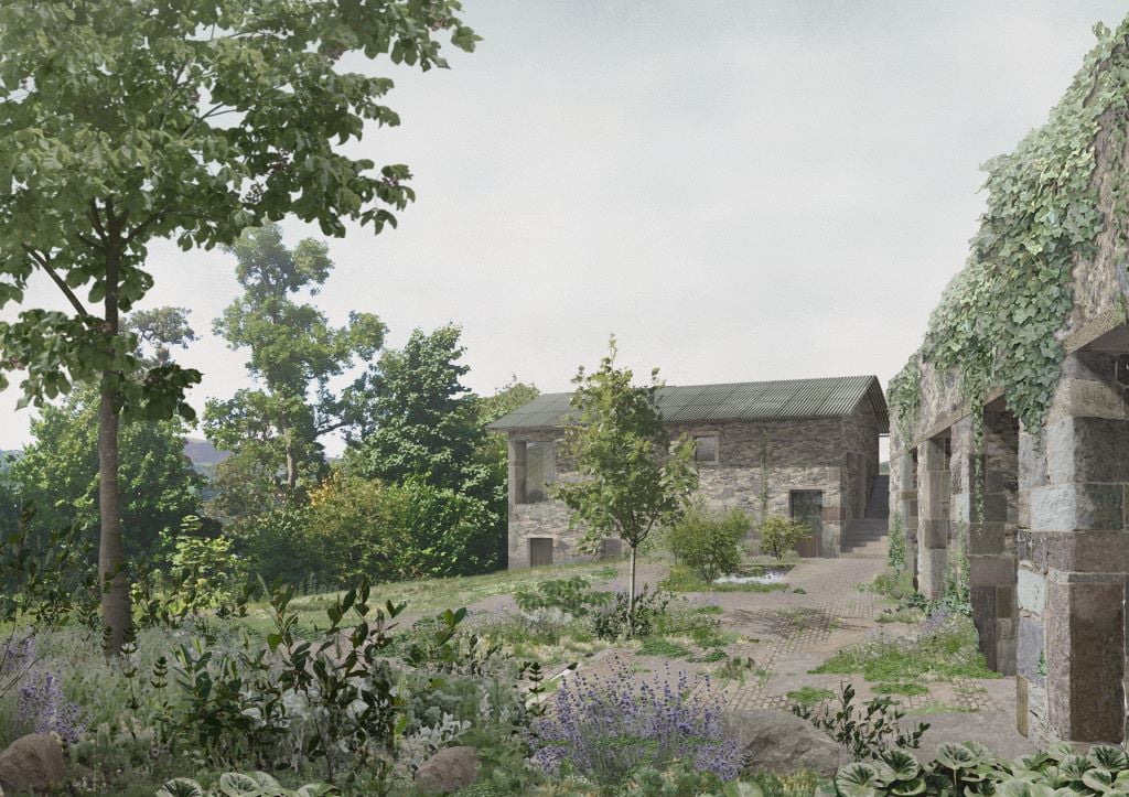 Stone houses with greenery and garden.