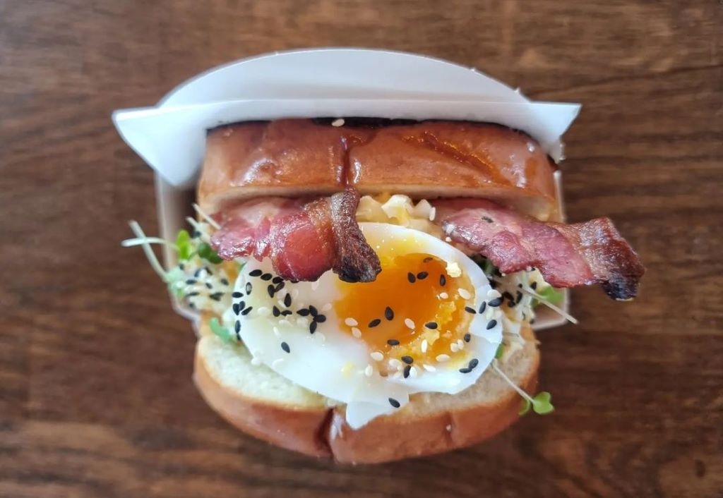 Bacon and egg bagel sandwich top view