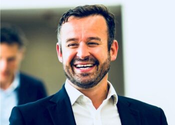 Smiling man in a suit and tie