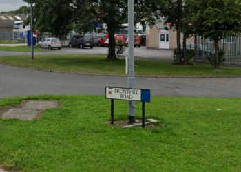 Brunthill Road sign in industrial area