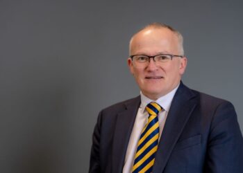 Man in suit with striped tie