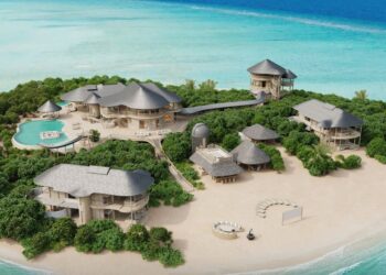 Luxury resort on tropical island with beach and pool