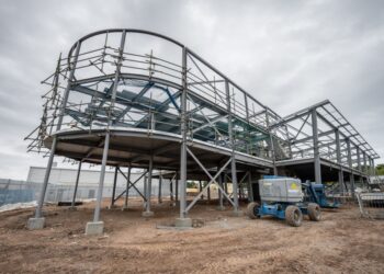 Steel framework construction site with equipment