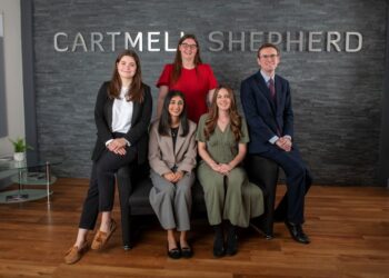 Cartmell Shepherd team group photo indoors