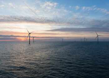 Offshore wind farm at sunrise.