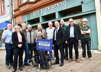 Midsteeple Quarter and RH Irving team members marking the handover of The Standard