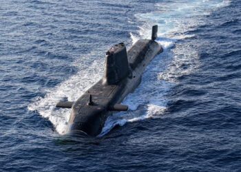Pictured: An Astute Class Submarine on the surface.United Kingdom Carrier Strike Group 21 (CSG21) consists of multiple vessels from the UK as well as ships from the United States Navy and the Dutch Navy. One of those assets includes an Astute Class Submarine. Whilst operating within the Mediterranean an Astute Class submarine conducted a rare surface; to interact and exercise with HMS Queen Elizabeth and the task group.HMS Queen Elizabeth is the deployed flag ship for CSG21 will see the ship along with the Strike Group work with over 40 countries from around the world. The Strike Group will operate and exercise with other Countries Navies and Air Forces during the 7 month deployment.The Strike Group includes ships from the United States Navy, The Dutch Navy, and Marines from the US Marine Corps. As well as UK Frigates, Destroyers two RFA supply ships and air assets from 617 Sqn, 820 NAS, 815 NAS and 845 NAS. This will be the largest deployment of Fifth Generation Fighter Jets in history.