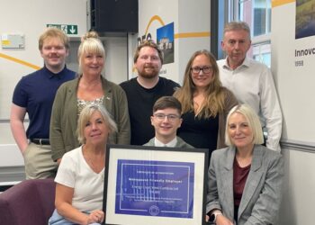 Members of the BEC team with the Menopause Friendly Accreditation certificate