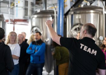 Head brewer Buster showing guests around the newly reopened brewery.