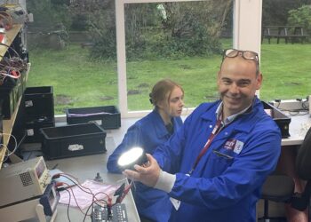 Mark Reynolds, product manager capability, demonstrates the 50,000 candles illumination strength of the dual mode taxi light used by Airbus aircraft.