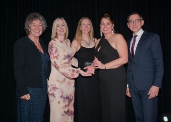 Bev Hurley CBE,  Transforming West Cumbria team, and Richard Jeffrey, who presented the award