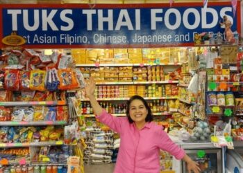 Market trader Aphinya during happier trading times,